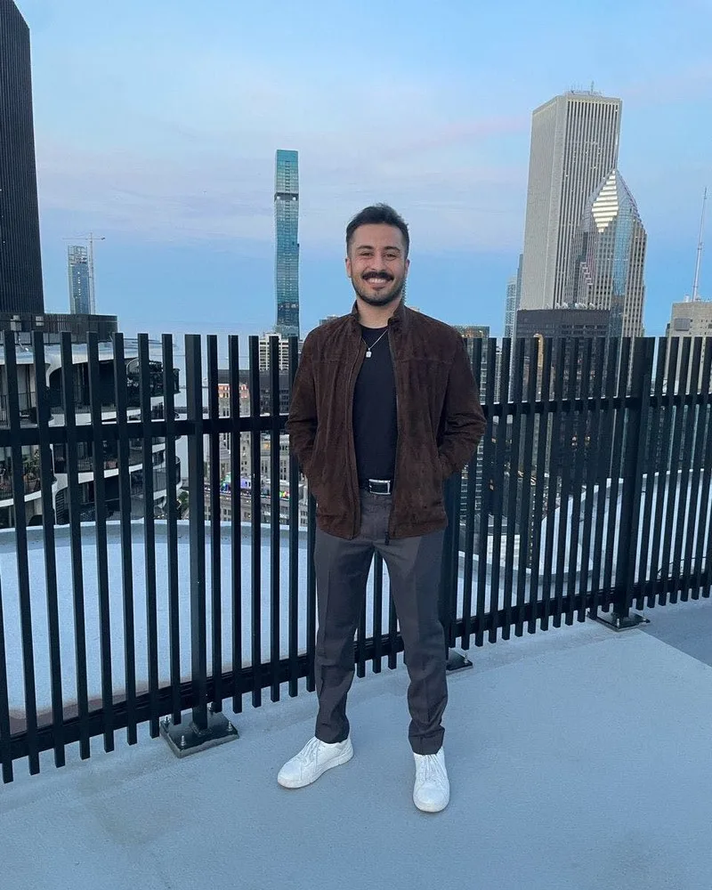 Bashir, Kojey's marketing strategist, on a rooftop in downtown Chicago